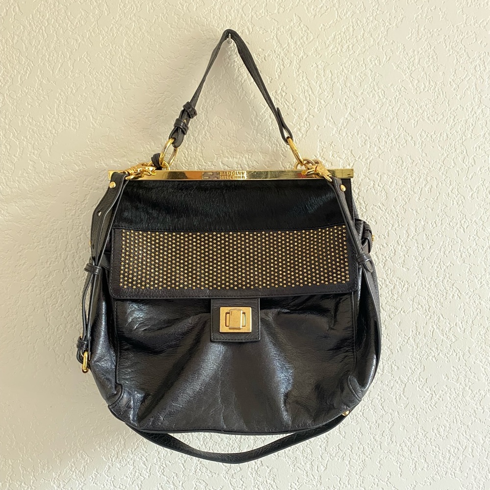 Black with fur and gold accents